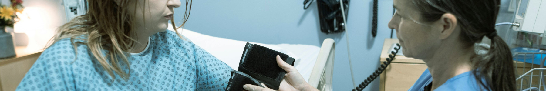 detox program header patient having blood pressure taken during recovery and testing